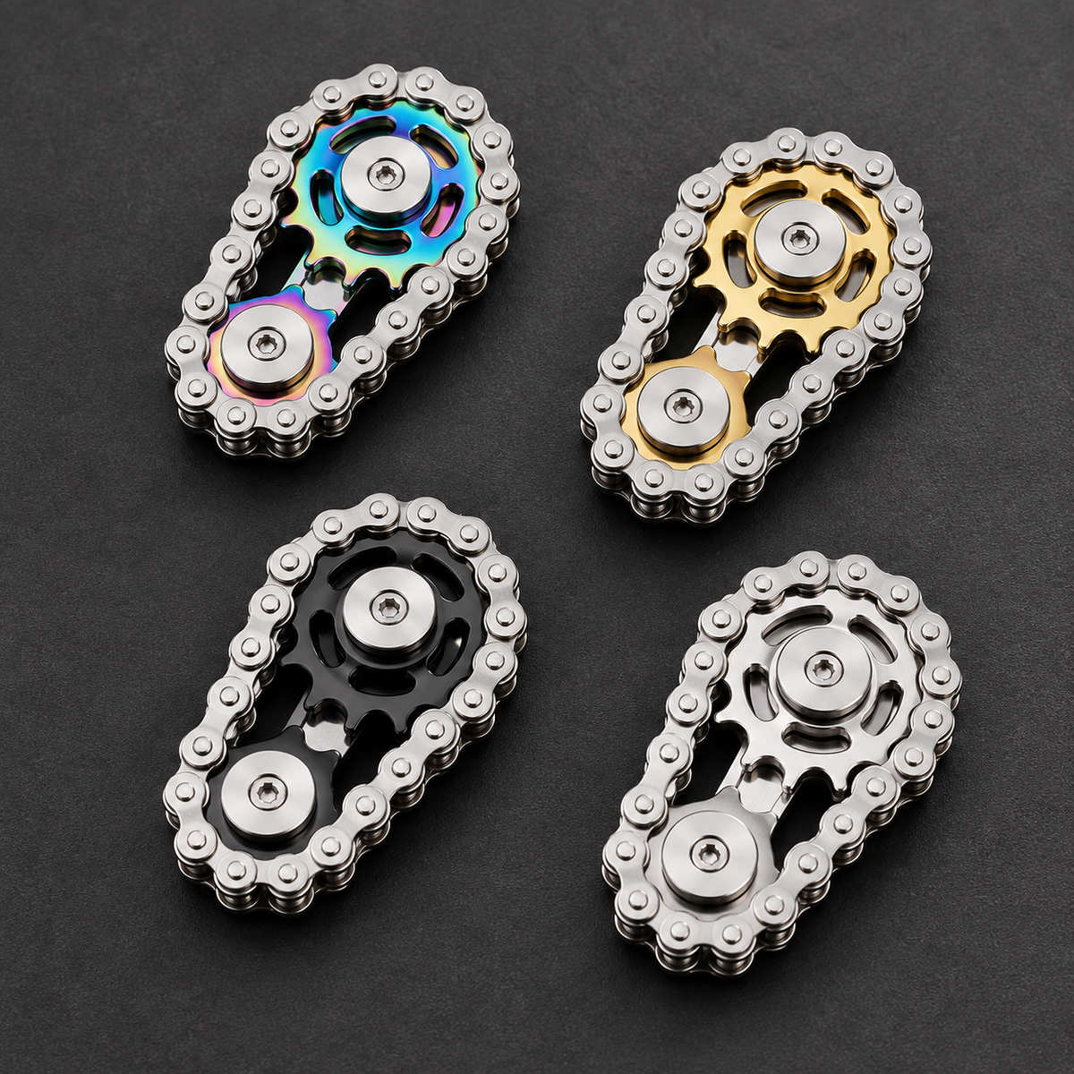 Four LHAPTIC LinkDrive alloy mechanical spinners in rainbow, gold, black, and silver