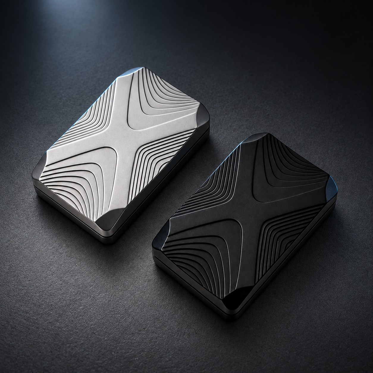 Silver and Black LHAPTIC Crossline Magnetic Sliders on a dark surface